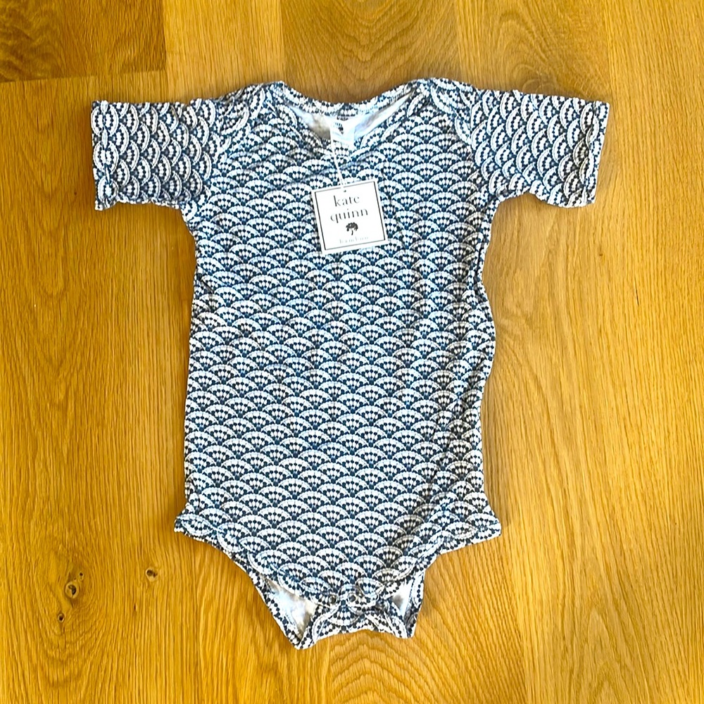 Kate Quinn onesie! Excellent condition, brand new with tags!!